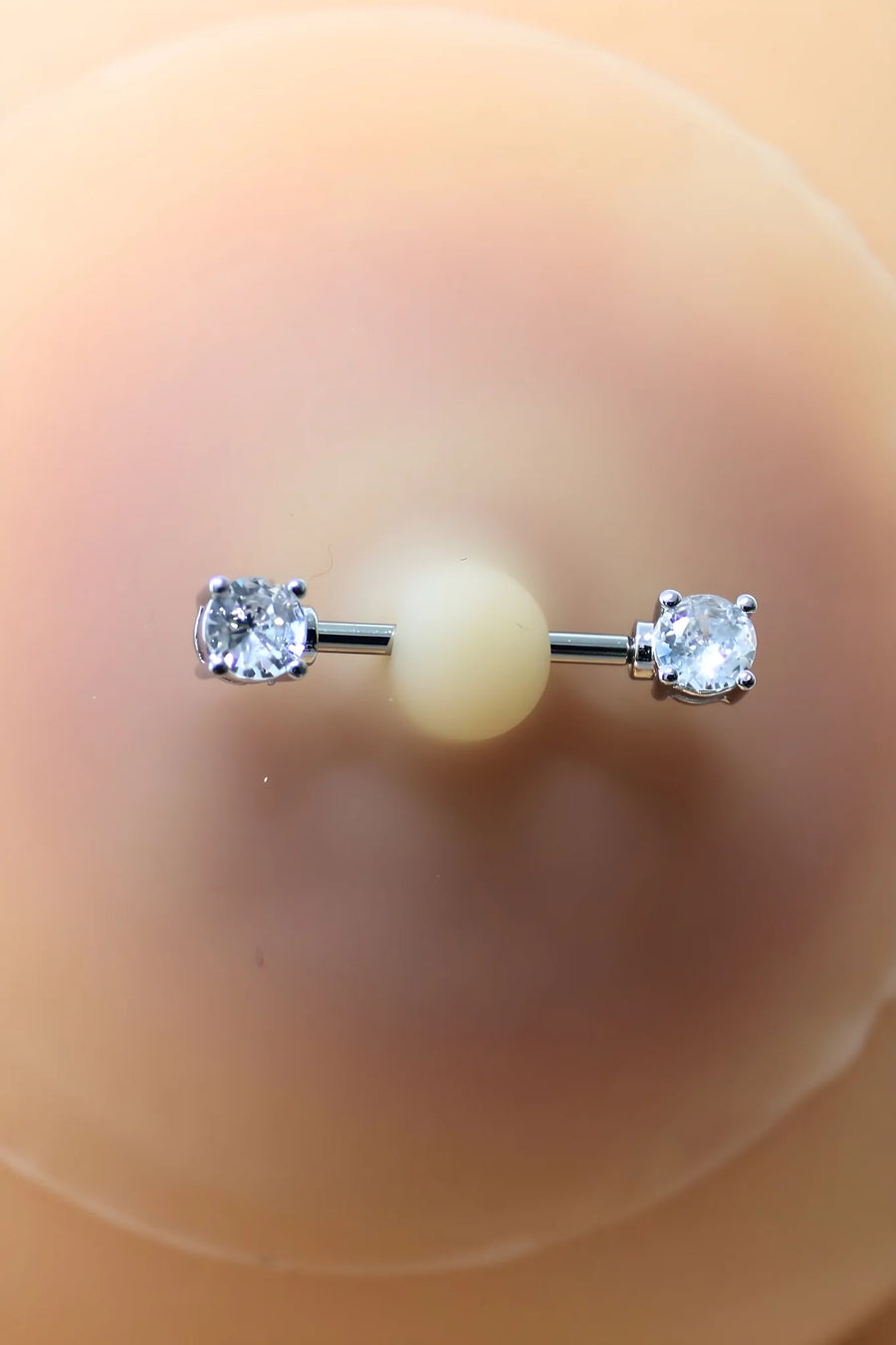 paire-de-cache-ttons-piercing-barre-faux-diamant-peau-claire | Voyage Sensuel