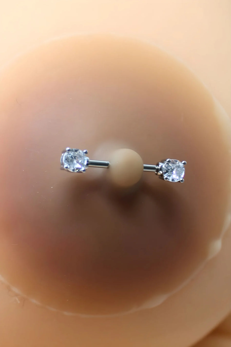 paire-de-cache-ttons-piercing-barre-faux-diamant-peau-mtisse | Voyage Sensuel