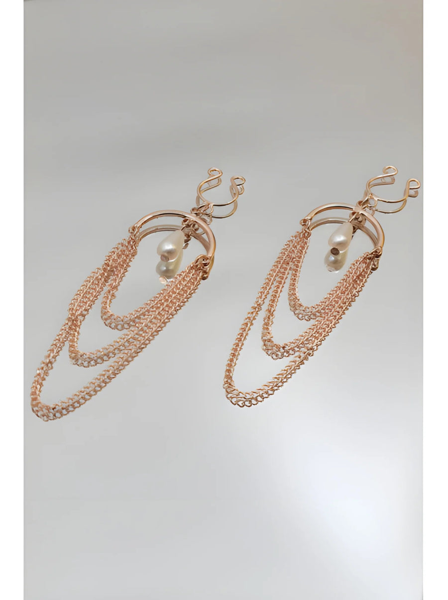 bijoux-de-seins-avec-3-chainettes-dor-rose-et-une-perle | Voyage Sensuel