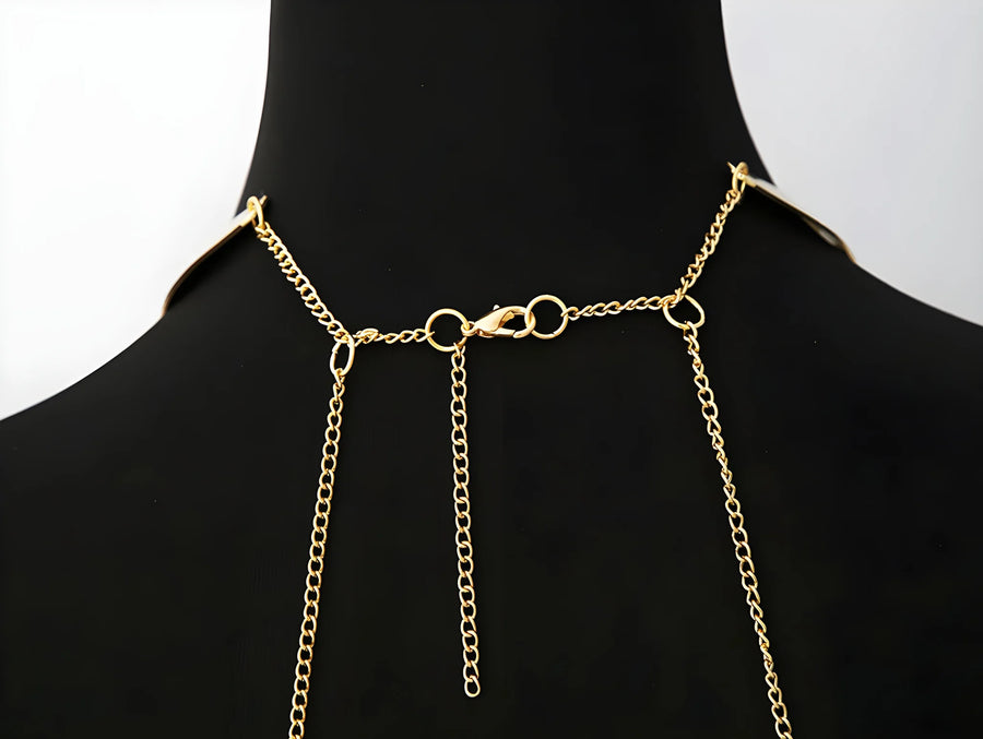 bijou-tour-de-cou-trois-anneaux-avec-chaines-de-corps-dor | Voyage Sensuel
